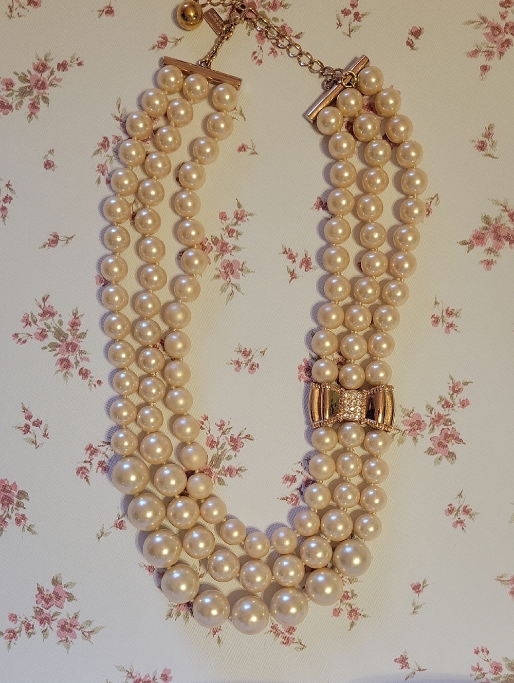 Kate Spade Ivory Pearl Multi-Strand Necklace with Gold Bow Accent